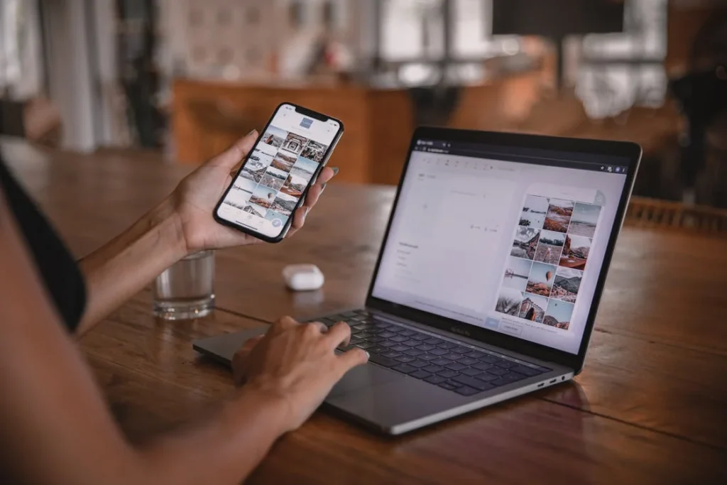 checking guest blogging and influencer outreach using her phone and laptop